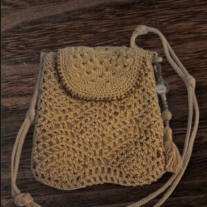 The Sak Handcrafted Crochet Flap Crossbody Bag Sak Tassel Keychain Gold Artistic